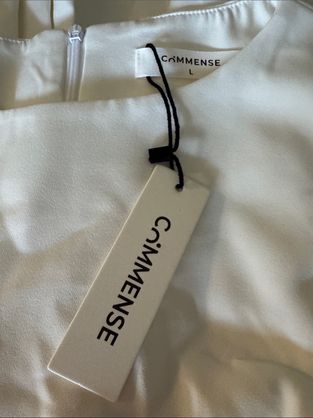 Commense Sleeveless White Pleated Hem Mini Dress - Picture 5 of 5